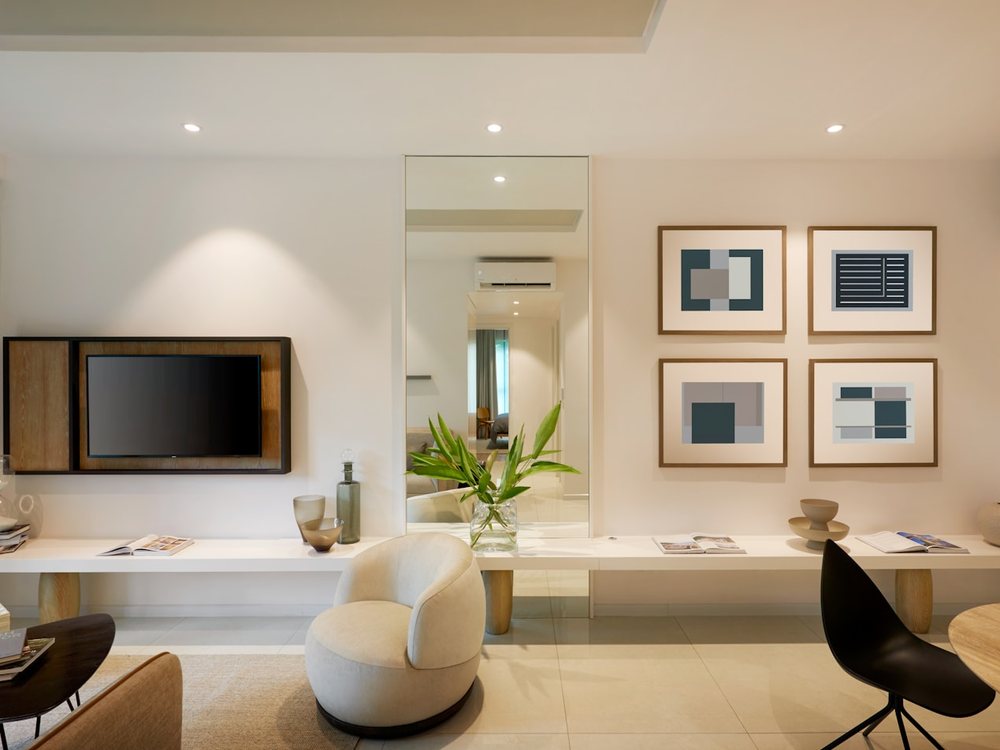 A furnished living room with layered lighting